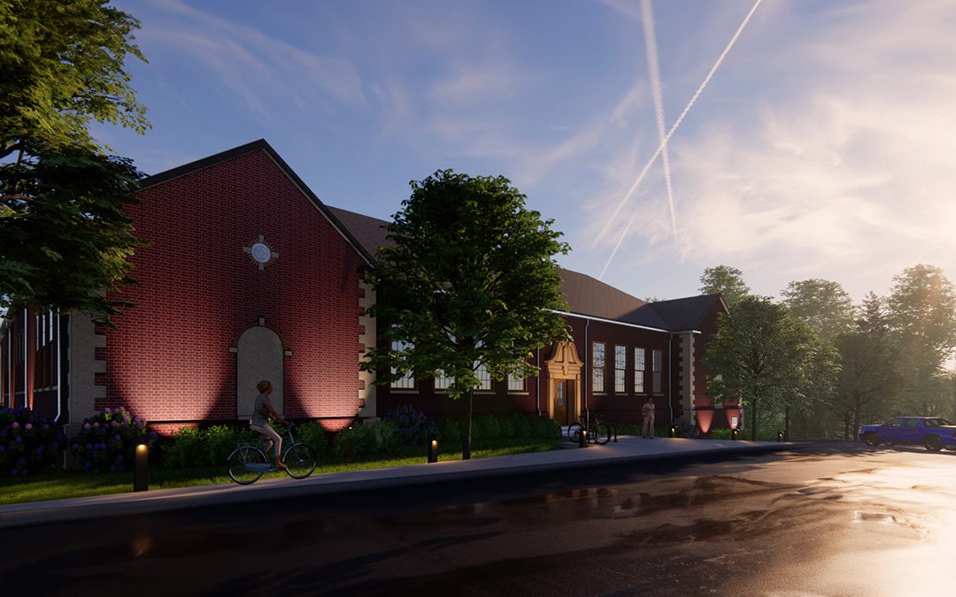 Historic Giffin School revitalization project by GAE Architecture + Design, featuring a cyclist and lush landscaping, designed and built by George Ewart, a top commercial architect firm in Knoxville, TN.