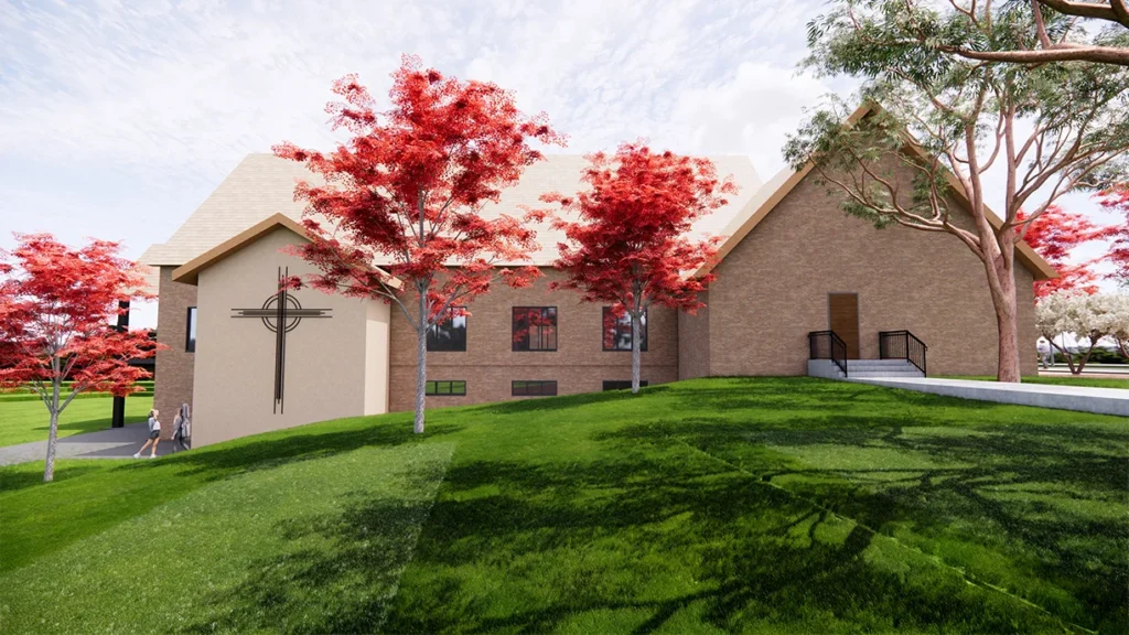 New Family Life Center at St. Joseph the Worker Catholic Church, featuring modern architecture, landscaped grounds, and a prominent cross design, designed and built by George Ewart, a top commercial architect firm in Knoxville, TN.