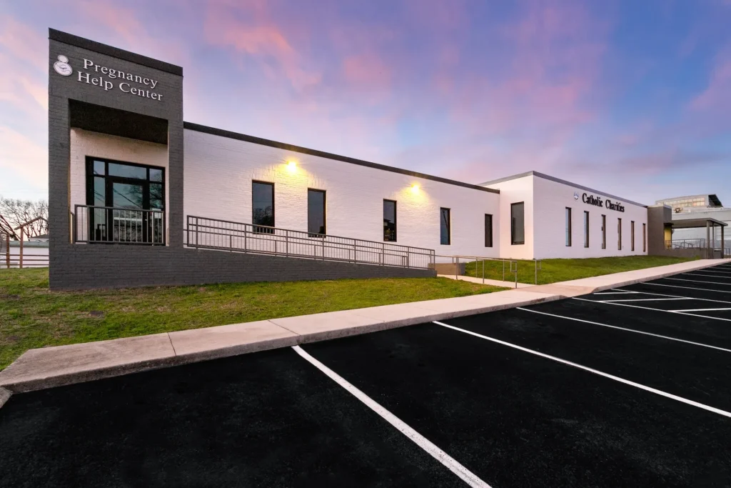 Pregnancy Help Center and Catholic Charities building exterior in Knoxville, TN, showcasing modern design and accessibility features, designed and built by George Ewart, a top commercial architect firm in Knoxville, TN.