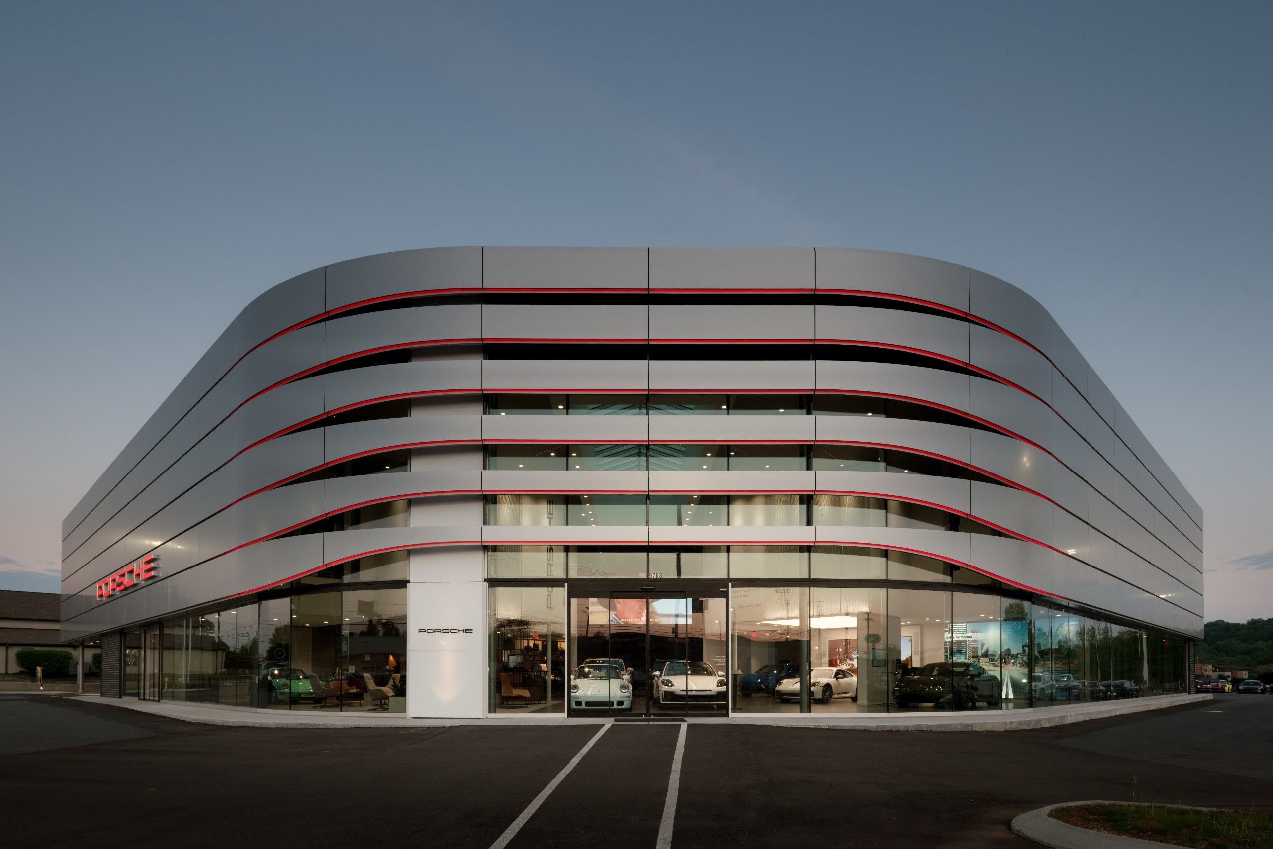 harper porsche dealership exterior, a commercial building designed by gae architecture + design